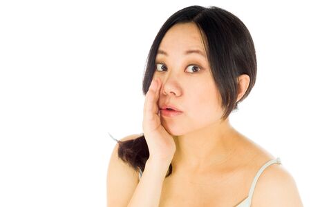 Pregnant adult asian woman isolated on white backgroundの写真素材
