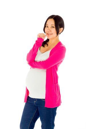 Pregnant adult asian woman isolated on white backgroundの写真素材