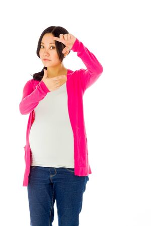 Pregnant adult asian woman isolated on white backgroundの写真素材