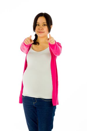 Pregnant adult asian woman isolated on white backgroundの写真素材