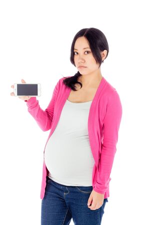 Pregnant adult asian woman isolated on white backgroundの写真素材