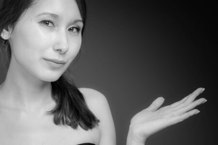 Model isolated on plain background in studio showcasingの写真素材