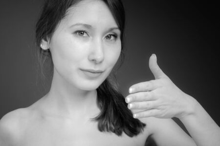 Model isolated with hand shakeの写真素材