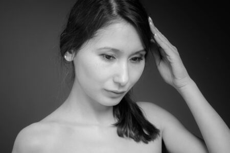 Model isolated with headacheの写真素材