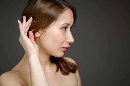 Model listening paying attentionの写真素材