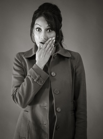 Adult indian woman in studio isolated on grey background, black and white imageの写真素材