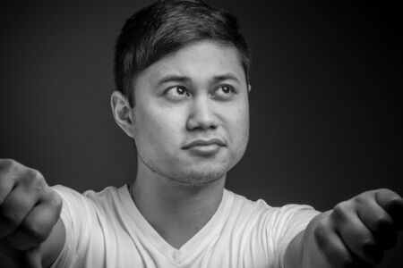 Model negative thumbs downの写真素材