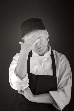 model isolated on plain background ashamed hiding face in handの写真素材