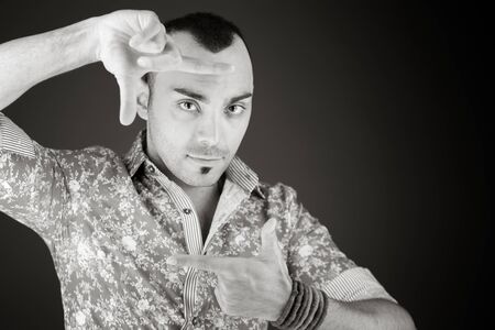 model isolated on plain background hand gesture framing focusingの写真素材