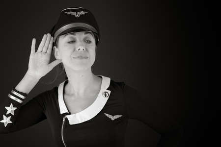 model isolated on plain background listening paying attentionの写真素材