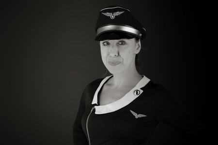 model isolated on plain background pround confident hands on hipの写真素材