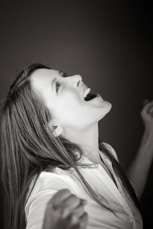 Model isolated on plain screamingの写真素材