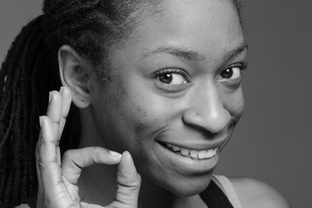 Model isolated ok signの写真素材