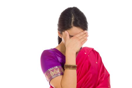 Model hiding face shameの写真素材