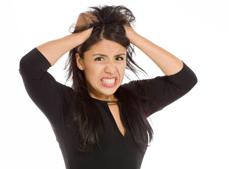 Stressed model pulling hairsの写真素材