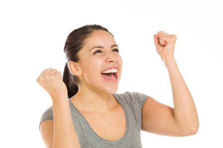 Model happy successful arms in the airの写真素材