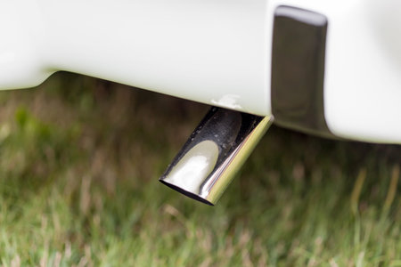 Close-up of exhaust pipe of a white classic vintage carの写真素材