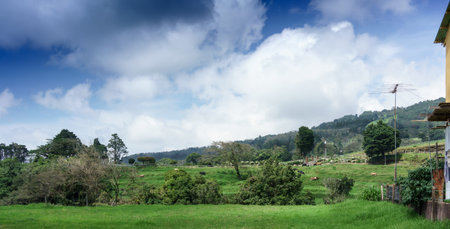 Rural landscape against cloudy sky, Costa Rica