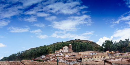Roof of houses against cloudy sky, Cusco, Peru