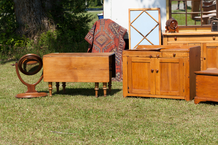 Old furniture for sale at flea marketの写真素材
