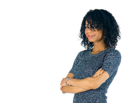 attractive woman on plein background shot in studio with soft lights with an interesting expression and dramatic lightingの写真素材