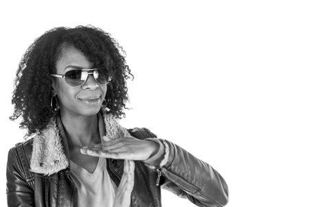 attractive woman on plein background shot in studio with soft lights with an interesting expression...