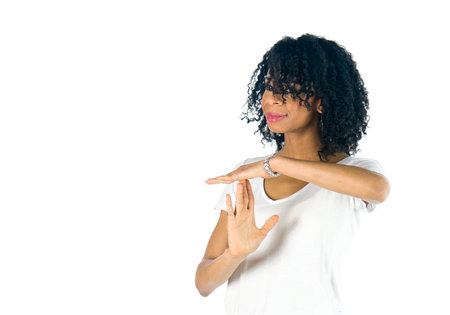 attractive woman on plein background shot in studio with soft lights with an interesting expression...