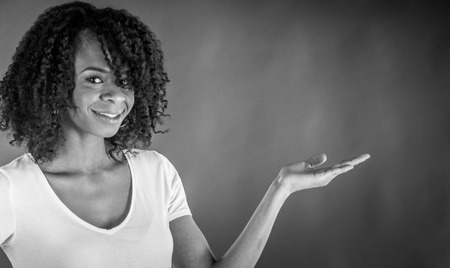 attractive woman on plein background shot in studio with soft lights with an interesting expression and dramatic lighting Black And White, b&wの写真素材