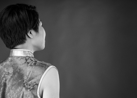 attractive woman on plein background shot in studio with soft lights with an interesting expression and dramatic lighting Black And White, b&wの写真素材