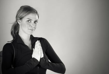 attractive woman on plein background shot in studio with soft lights with an interesting expression and dramatic lighting Black And White, b&wの写真素材