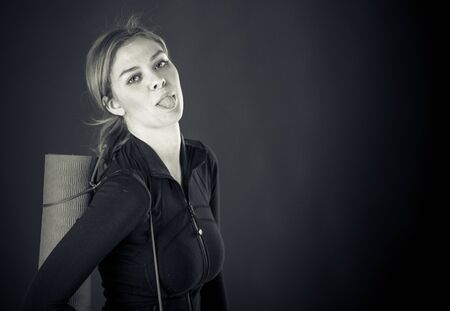attractive woman on plein background shot in studio with soft lights with an interesting expression and dramatic lighting Black And White, b&wの写真素材