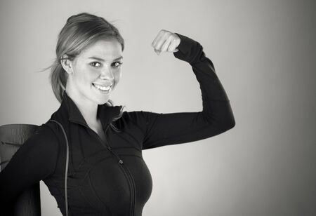 attractive woman on plein background shot in studio with soft lights with an interesting expression and dramatic lighting Black And White, b&wの写真素材