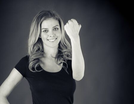 attractive woman on plein background shot in studio with soft lights with an interesting expression and dramatic lighting Black And White, b&wの写真素材