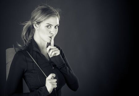 attractive woman on plein background shot in studio with soft lights with an interesting expression and dramatic lighting Black And White, b&wの写真素材