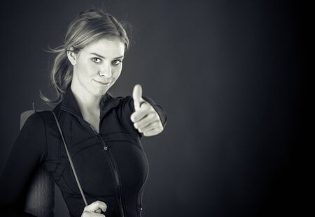 attractive woman on plein background shot in studio with soft lights with an interesting expression and dramatic lighting Black And White, b&wの写真素材
