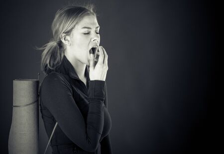 attractive woman on plein background shot in studio with soft lights with an interesting expression and dramatic lighting Black And White, b&wの写真素材