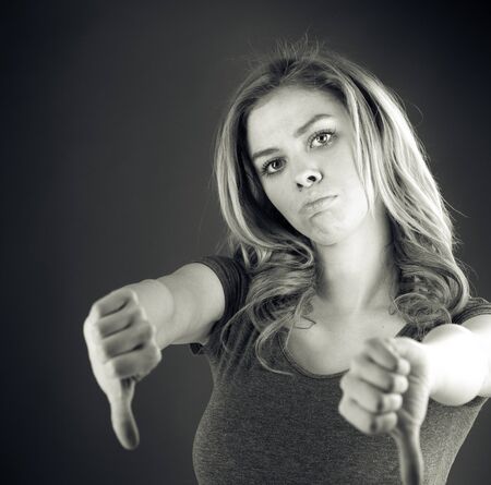 attractive woman on plein background shot in studio with soft lights with an interesting expression and dramatic lighting Black And White, b&wの写真素材