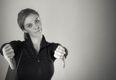 attractive woman on plein background shot in studio with soft lights with an interesting expression and dramatic lighting Black And White, b&wの写真素材