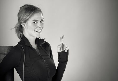 attractive woman on plein background shot in studio with soft lights with an interesting expression and dramatic lighting Black And White, b&wの写真素材