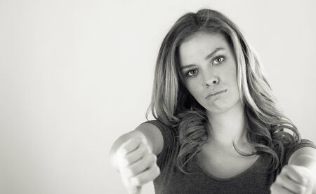 attractive woman on plein background shot in studio with soft lights with an interesting expression and dramatic lighting Black And White, b&wの写真素材