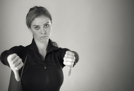 attractive woman on plein background shot in studio with soft lights with an interesting expression and dramatic lighting Black And White, b&wの写真素材