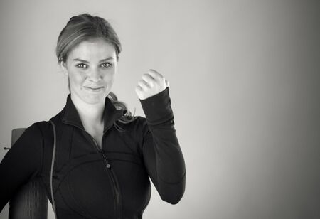 attractive woman on plein background shot in studio with soft lights with an interesting expression and dramatic lighting Black And White, b&wの写真素材