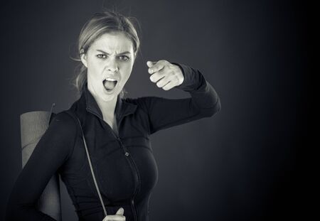 attractive woman on plein background shot in studio with soft lights with an interesting expression and dramatic lighting Black And White, b&wの写真素材