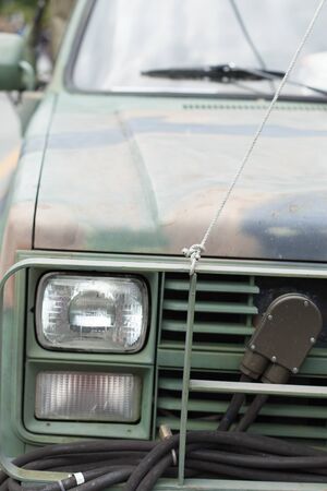 Armed Forces, Army, Bonnet, Colour Image, Day, Glass - Material, Green, Headlight, Heavy Goods Vehicle, Land Vehicle, Military, Military Land Vehicle, Mode Of Transport, No People, Outdoors, Photography, Transportation, Travel, Vertical, Windscreen Wiperの写真素材