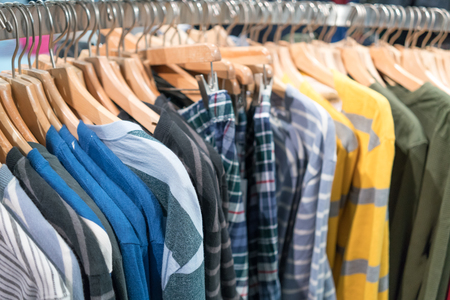 Store, Department Store, Retail, Choice, Merchandise, Selling, Clothing, For Sale, Small Business, Textile, Lifestyles, Variation, Photography, Indoors, No People, Colour Image, Still Life, Coathanger, Rack, Hanging, Wood - Material, Large Group Of Objectの写真素材