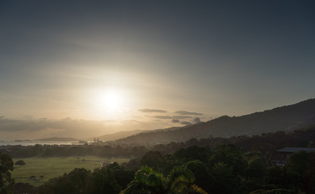 Back Lit, Beauty In Nature, Cloud - Sky, Colour Image, Docks, Environment, Field, Forest, Green, Growth, Horizontal, Landscape, Mountain, Mountain Range, Nature, No People, Outdoors, Palm Tree, Photography, Scenics, Sky, Sun, Sunlight, Sunrise, Tranquil Sの写真素材