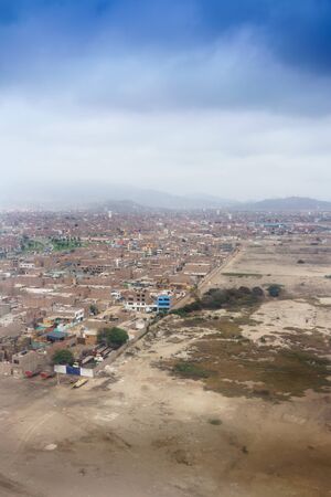 Colour Image, Photography, Day, Outdoors, No People, Vertical, Architecture, Building Exterior, Built Structure, City, Cityscape, Aerial View, Sunlight, Travel Destinations, Urban Scene, Travel, Landscape, Mountain Range, Mountain, Sky, Cloud - Sky, Envirの写真素材