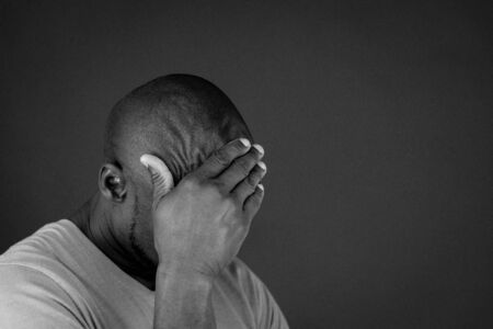 model isolated white background hiding shame ashamedの写真素材