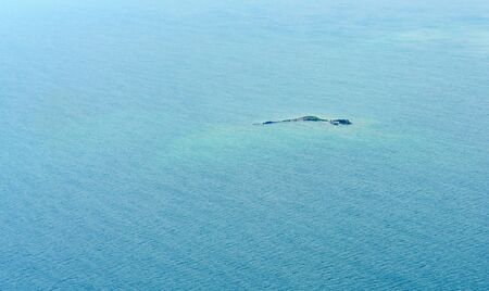 Seascape at day, with exposed offshore rock, Toronto, Ontario, Canada. aerial picture from ontario canada 2016の写真素材
