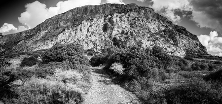 Landscape with dirt road to mountain, Crete, Greeceの写真素材